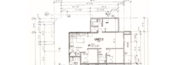 A floor plan drawing for Unit C shows a layout with labeled rooms and dimensions.
