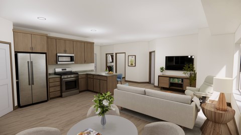 A modern kitchen with a refrigerator, microwave, oven, and sink.
