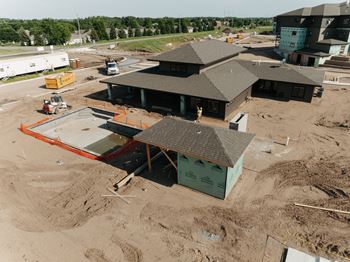 an aerial view of a building under construction in a building construction site