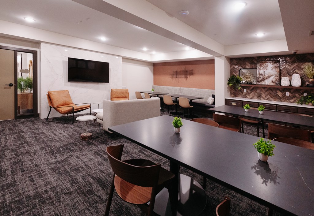 a conference room with a large table and chairs