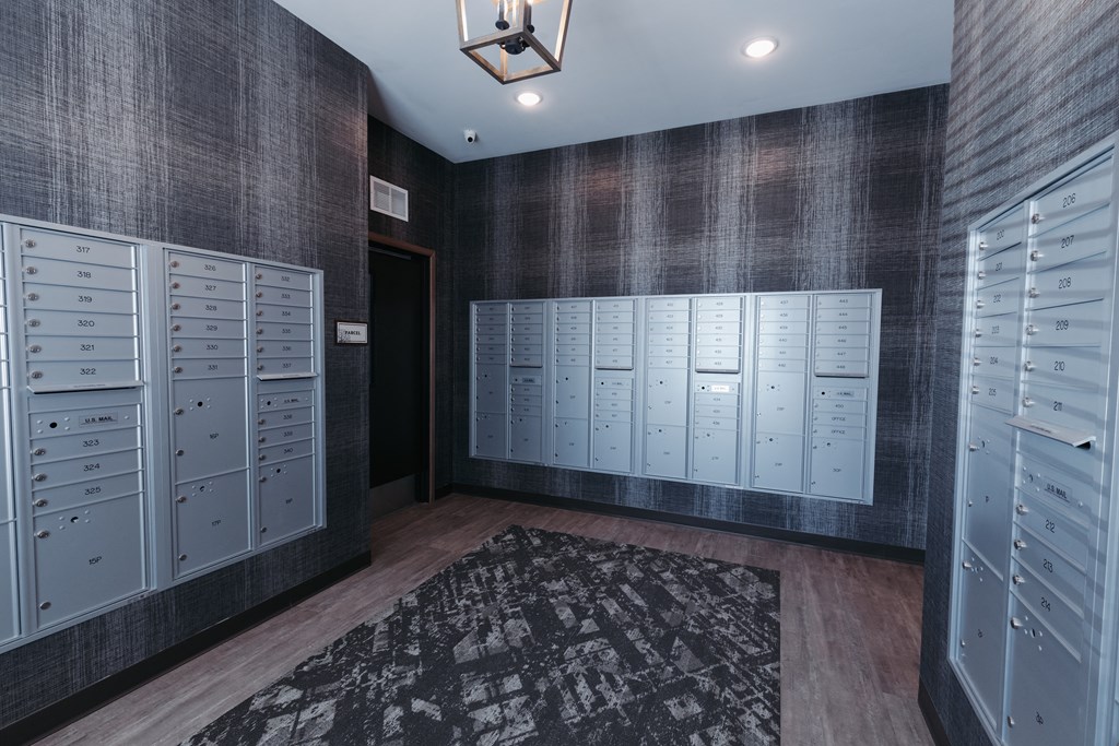 a locker room with lockers and wardrobes and a rug