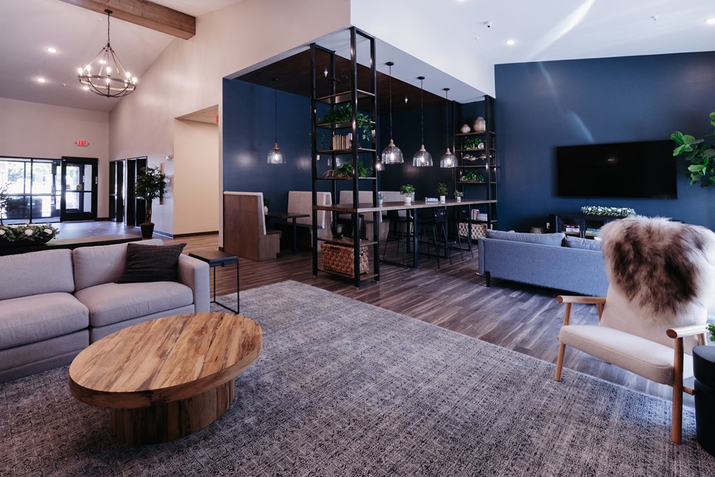 a living room with couches and a coffee table