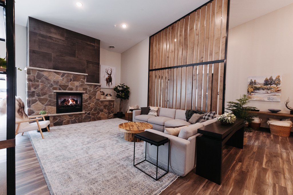 a living room with a couch and a fireplace