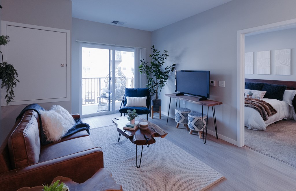 a living room with a couch and a tv