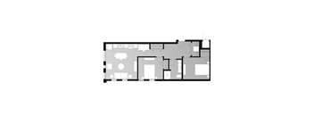 a floor plan of a small house with a green yard