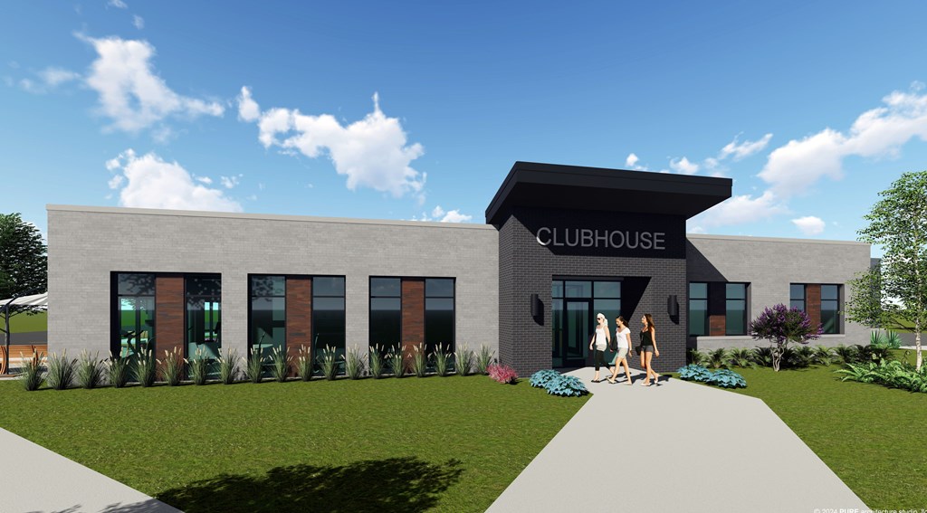 A modern clubhouse with two people walking in front.