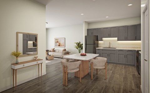 A modern kitchen with a dining table and chairs.