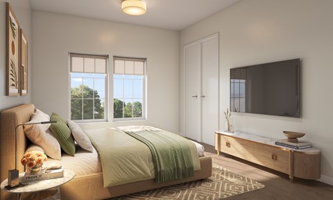 A bedroom with a bed, a nightstand, a dresser, and a window.