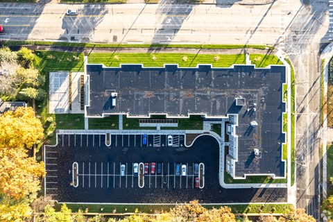 A parking lot with a large number of parking spaces.