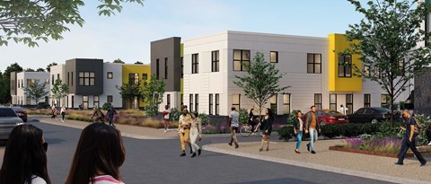 A street scene with people walking and cars parked on the side of the road.