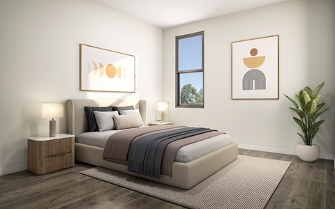 A modern bedroom with a large bed, a nightstand, and a potted plant.