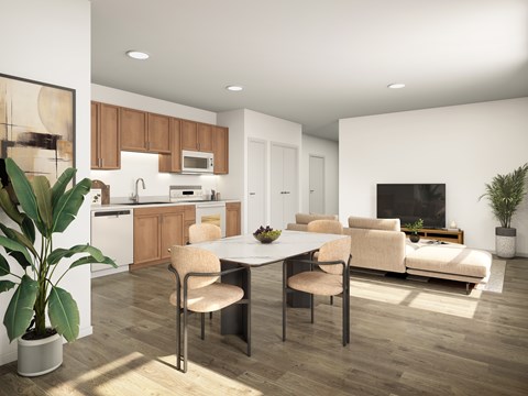 A modern kitchen with a dining table and chairs.
