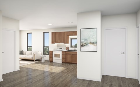 A modern living room with a white sofa and a wooden cabinet.