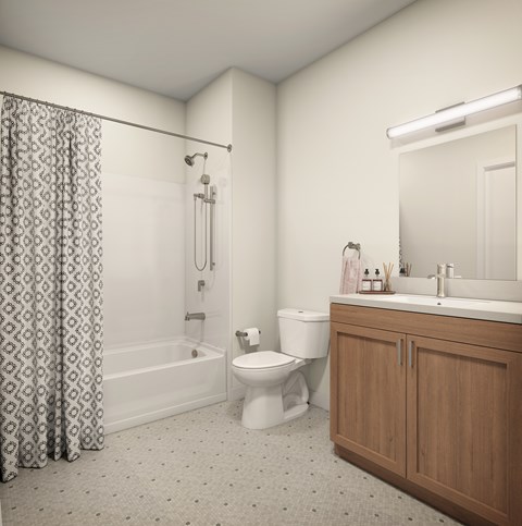 A white toilet sits next to a bathtub in a bathroom.