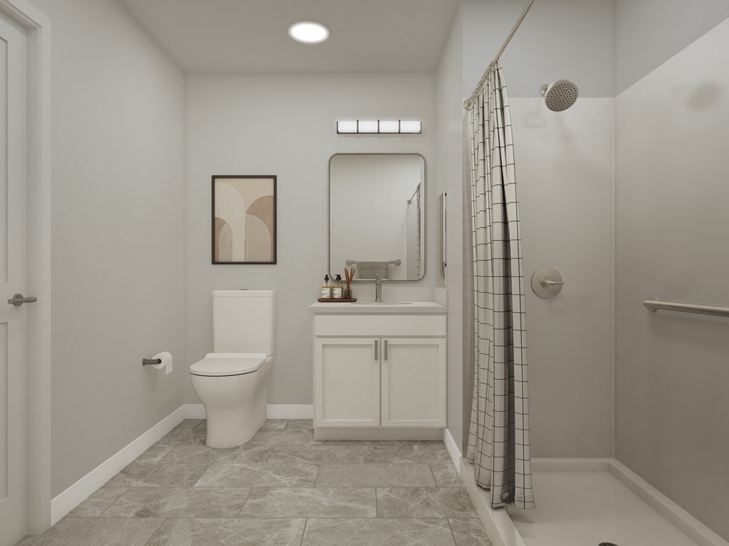a white bathroom with a shower toilet and sink