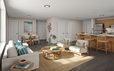 A modern living room with a sofa, chairs, and a coffee table.