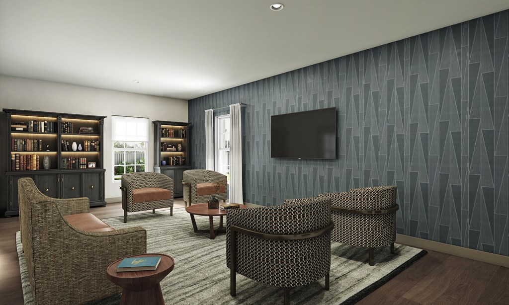 a living room filled with furniture and a television