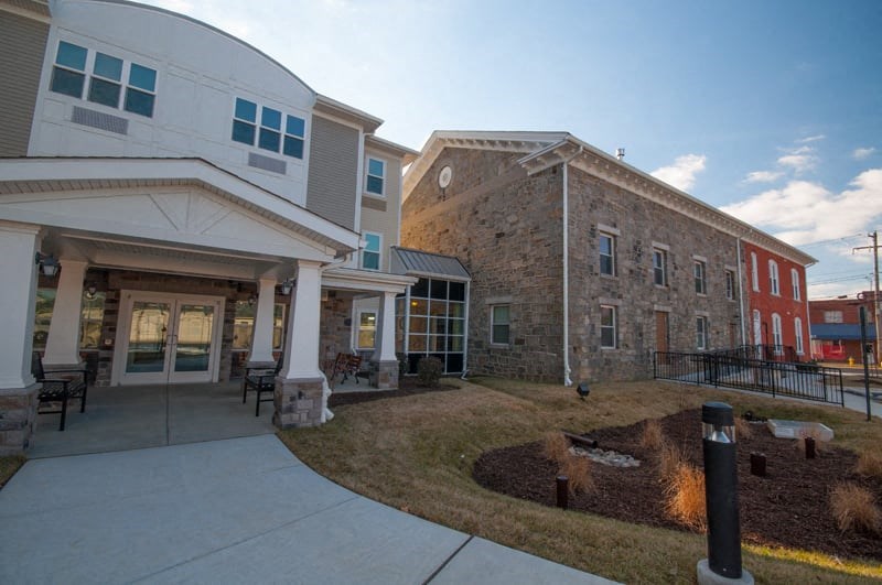 an exterior view of a building and a sidewalk