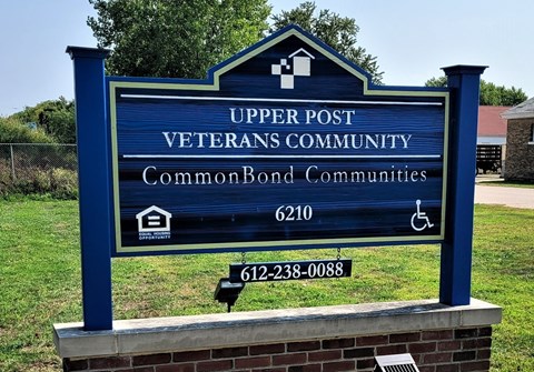 A sign for the Upper Post Veterans Community in CommonBond Communities.