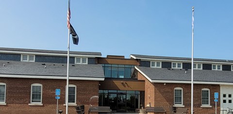 A building with a flag on top of it.