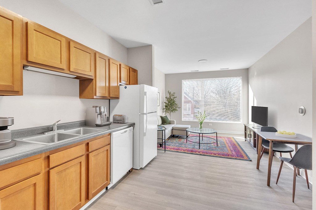 our apartments offer a kitchen and living room with a large window