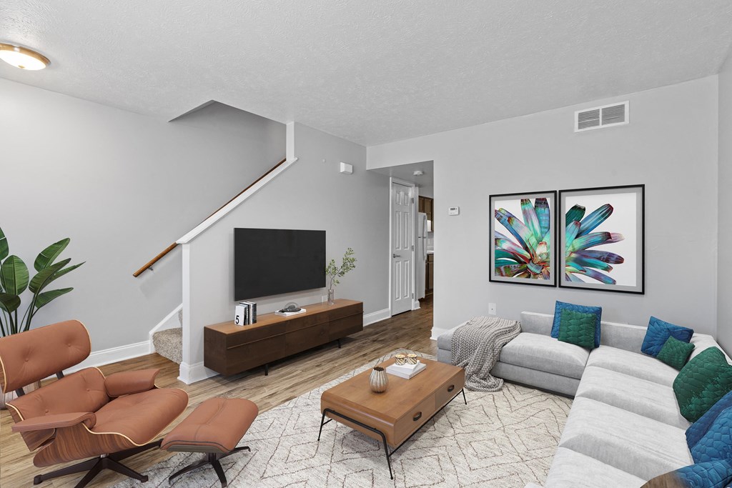 a living room with gray walls and a white ceiling