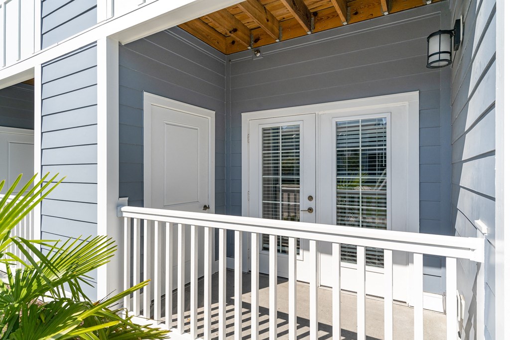 a house with blue siding and a wood ceiling at The Parker Myrtle Beach, South Carolina, 29588