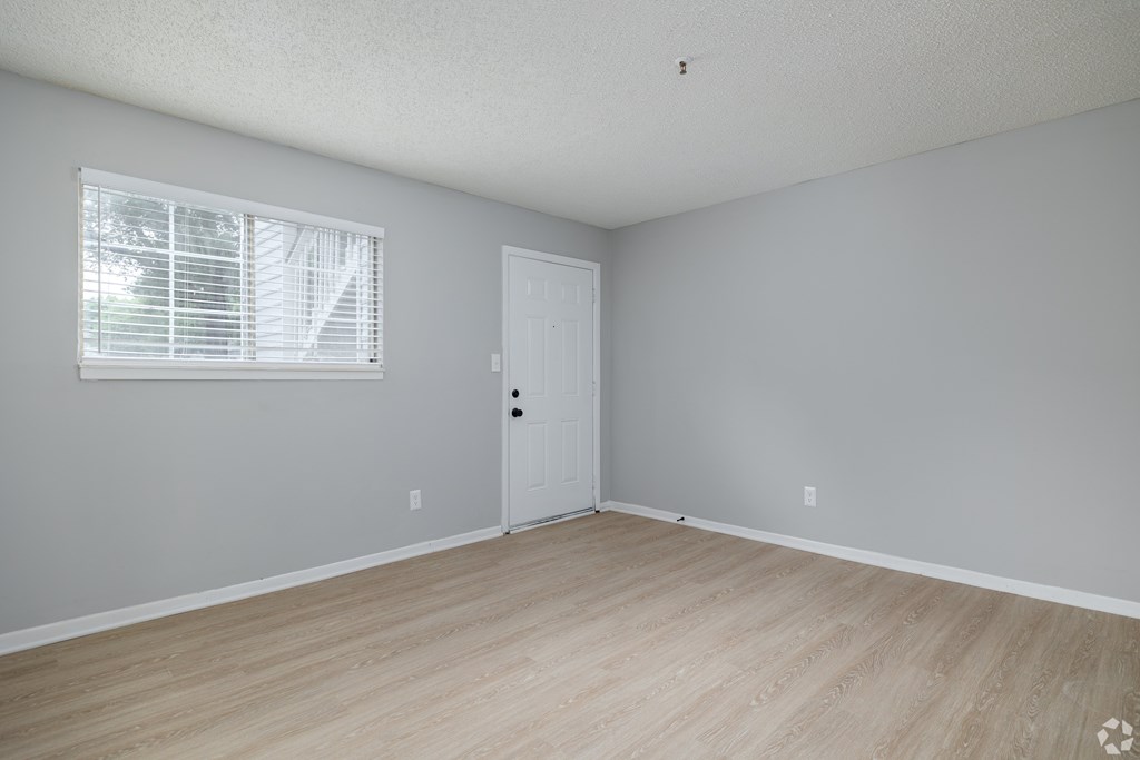 A Room With Wooden Flooring at Avondale Place Apartments, Georgia