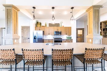 a large kitchen with a large table and chairs at The Parker Austin, Texas