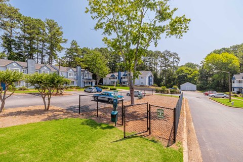 A residential area with houses and a playground.