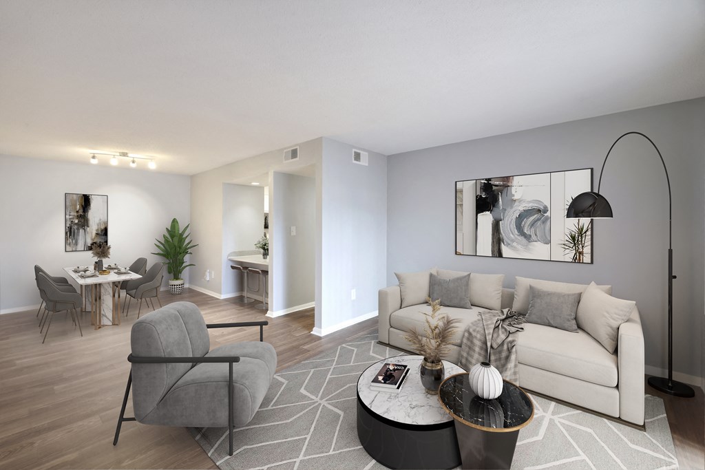 Living room with a couch and a coffee table  at Governors House, Huntsville, 35805