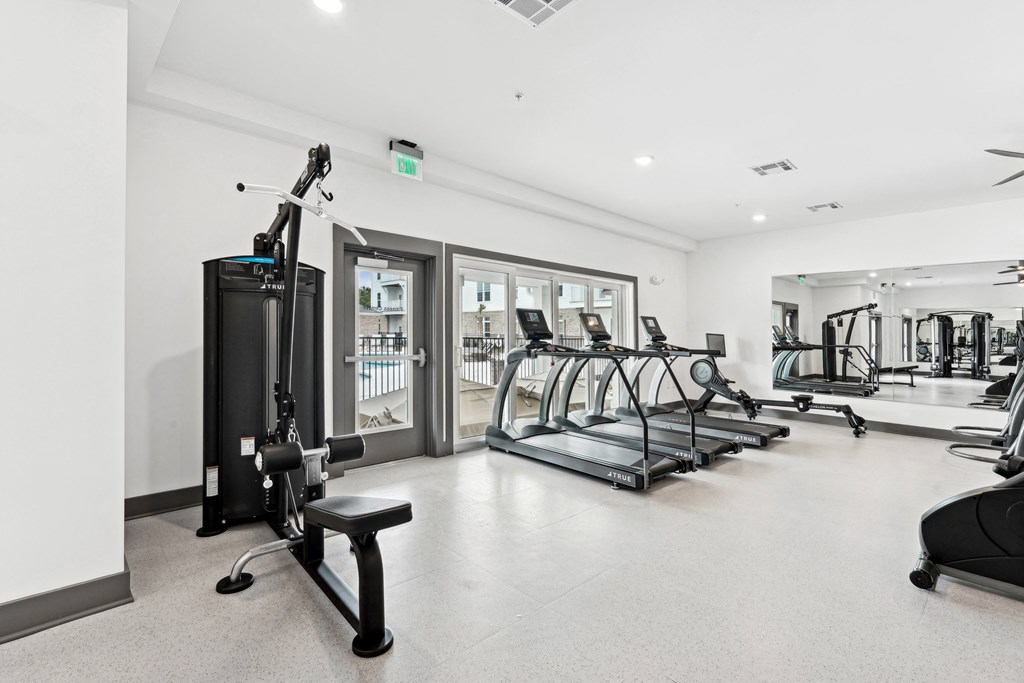 Gym with treadmills and other fitness equipment at the flats at The Leo Myrtle Beach, Myrtle Beach, SC, 29579