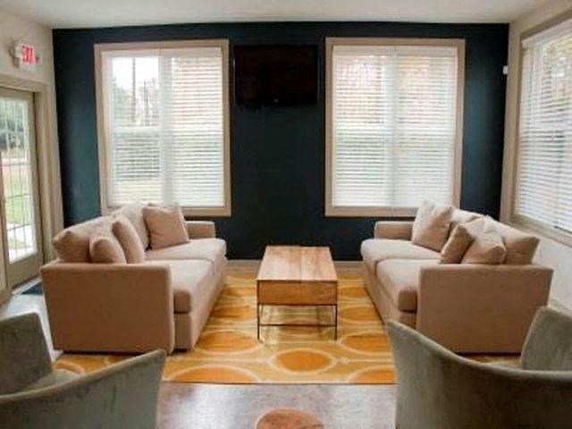 Living room with two couches at Emory Woods Apartments, Durham, NC, 28205..