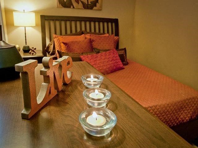 Bedroom with furniture at Emory Woods Apartments, Durham, NC.