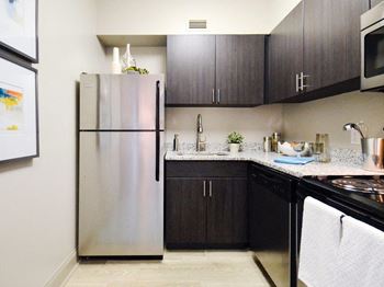 Refrigerator , cabinets and appliances at 500 Fifth Apartments, Nashville