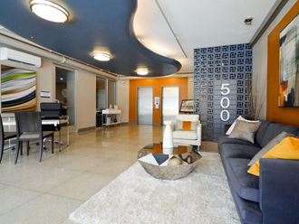 a living room with a couch and a table