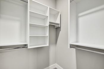 Empty white shelves in a room at The Ashton at East Park Apartments, Kennesaw, Georgia