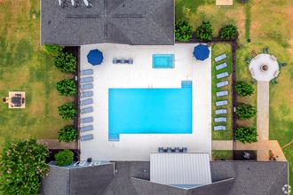 arial view of a swimming pool in a backyard