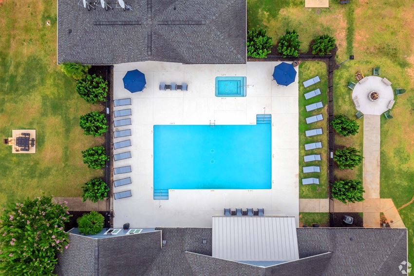 arial view of a swimming pool in a backyard - Photo Gallery 1