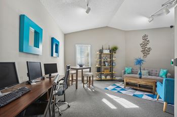 Spacious living room and dining room with a table and chairs and a computer desk  at Cape Landing, Myrtle Beach, South Carolina
