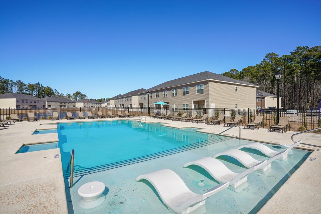 Resort style pool with lounge chairs  at The Meadows, Georgia