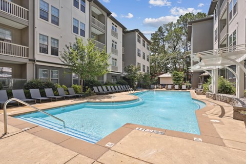 A large swimming pool surrounded by apartment buildings at Union Eleven Apartments, Atlanta, GA
