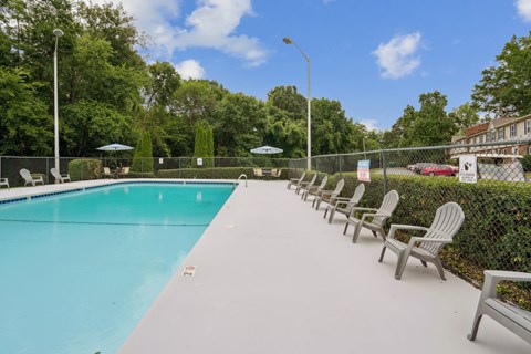Pool with Chairs at The Highlands Apartments, North Carolina, 28217