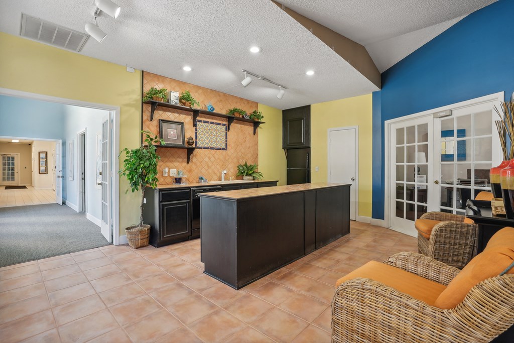 Kitchen with an island in the middle of a living room  at Cape Landing, Myrtle Beach, SC