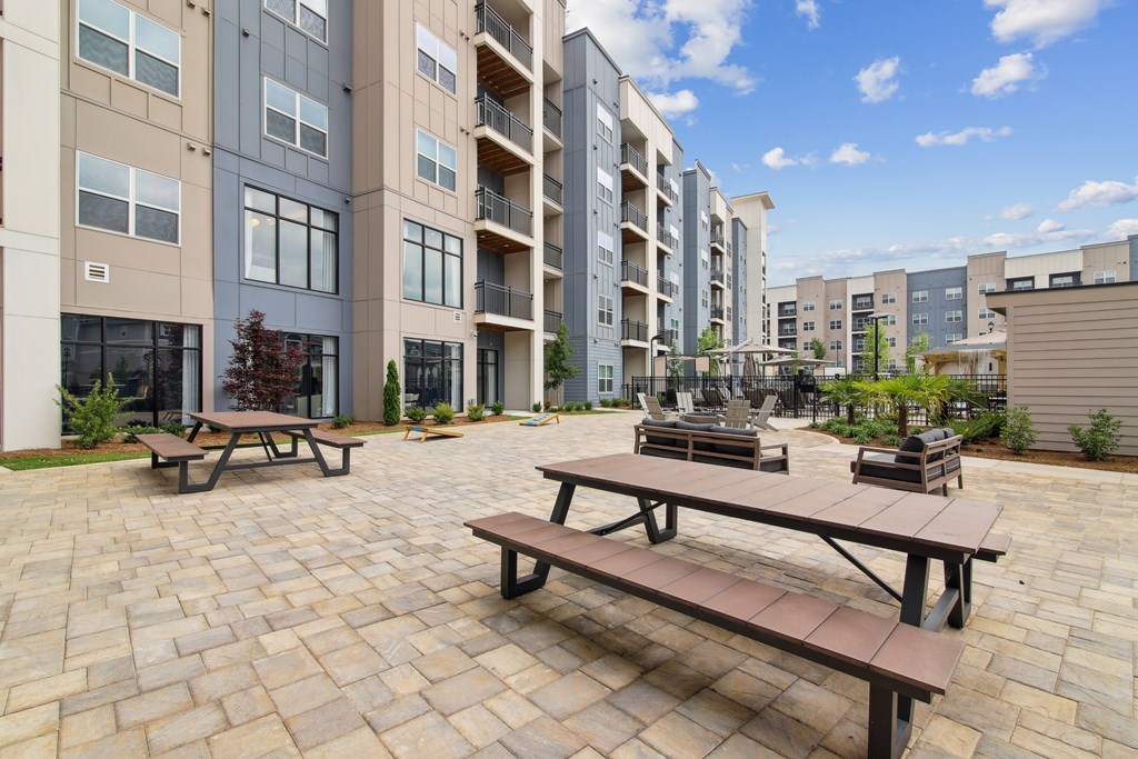 Outdoor Picnic Tables at The Delaney at East Park Apartments, Kennesaw, GA, 30144