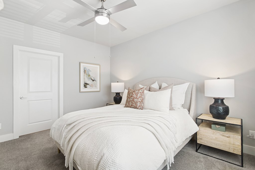 White Bedroom at The Delaney at East Park Apartments, Kennesaw, 30144