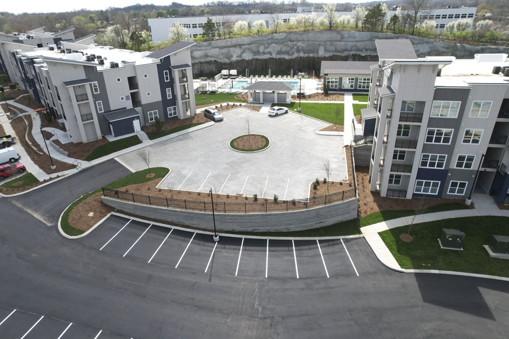 A parking lot in front of apartment buildings at The Percy Apartments, Nashville