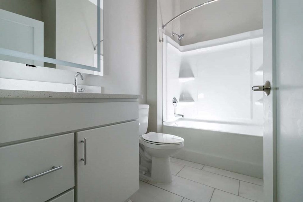 a bathroom with a toilet and a sink