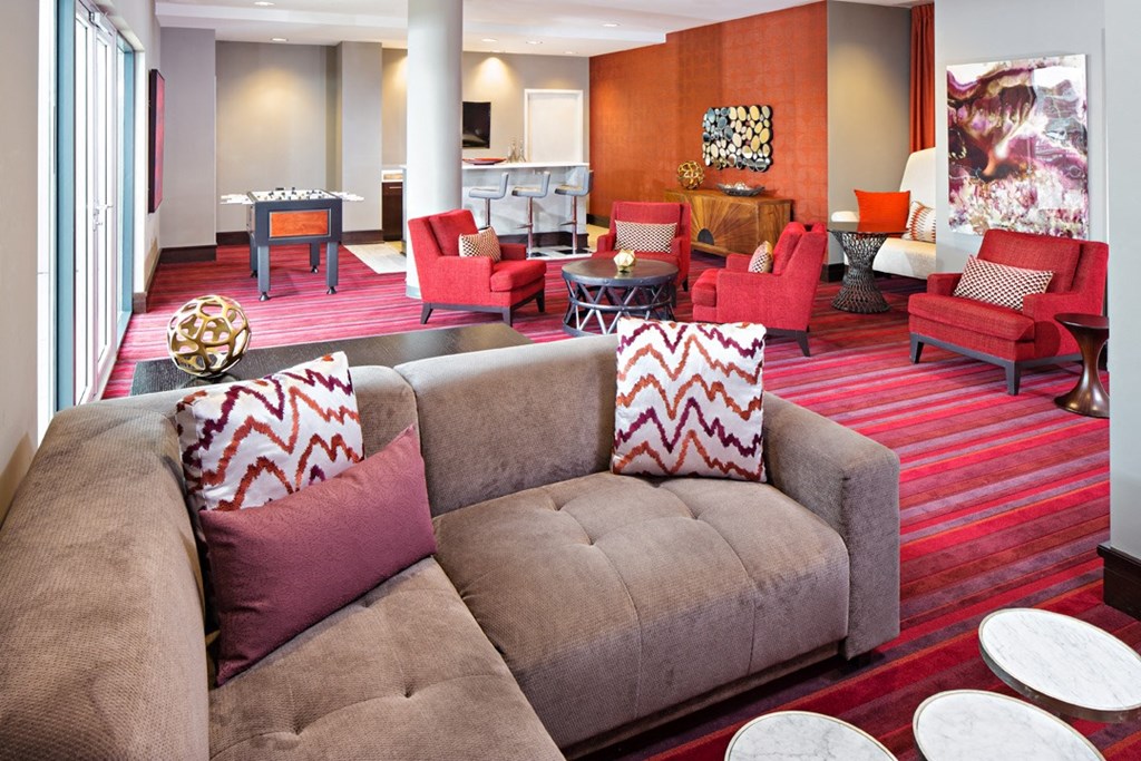 a living room with a bunch of couches in it