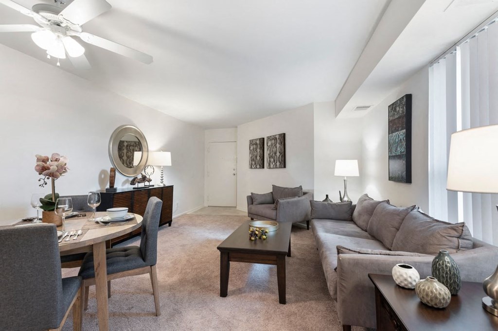 a living room with a couch and a table